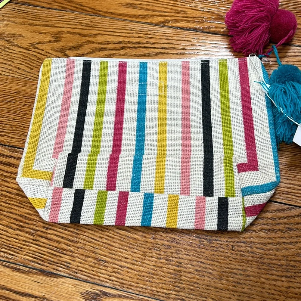 Mud Pie new with tag striped jute bag. Green, pink, black gold. Pompom tassles.